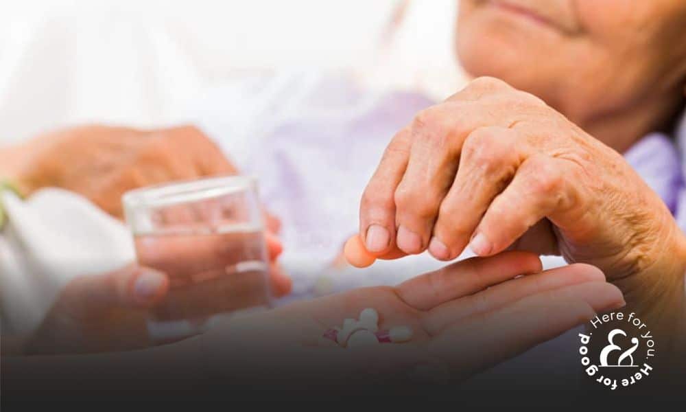 elderly woman taking medication
