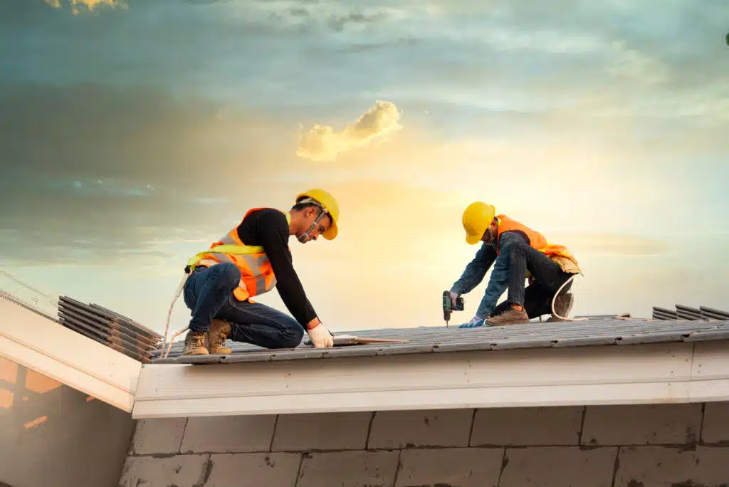 Engineer workers install new roof
