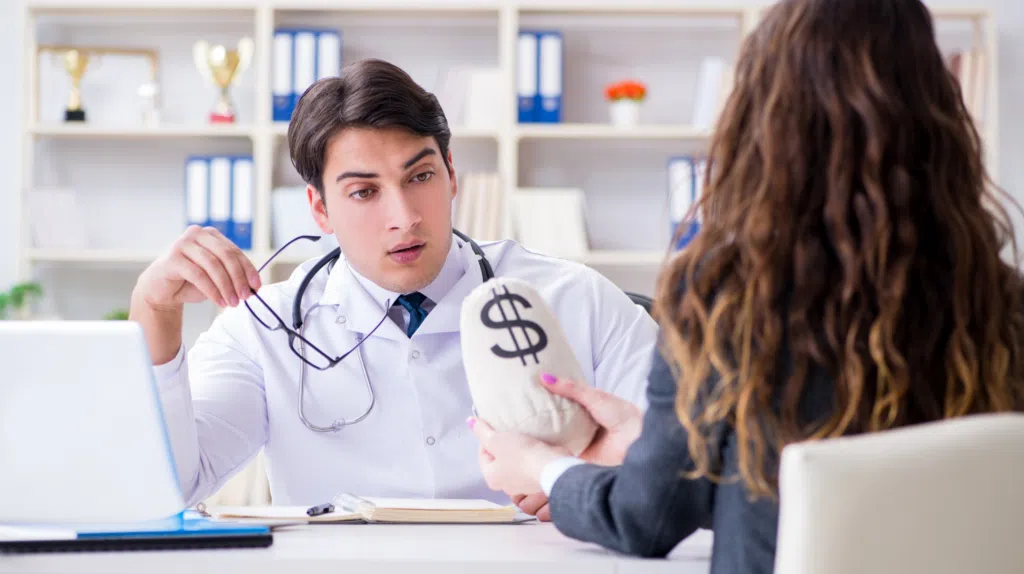 A doctor talking to a patient