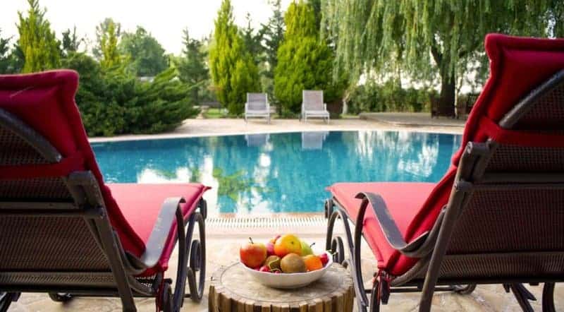 pool chairs with apples