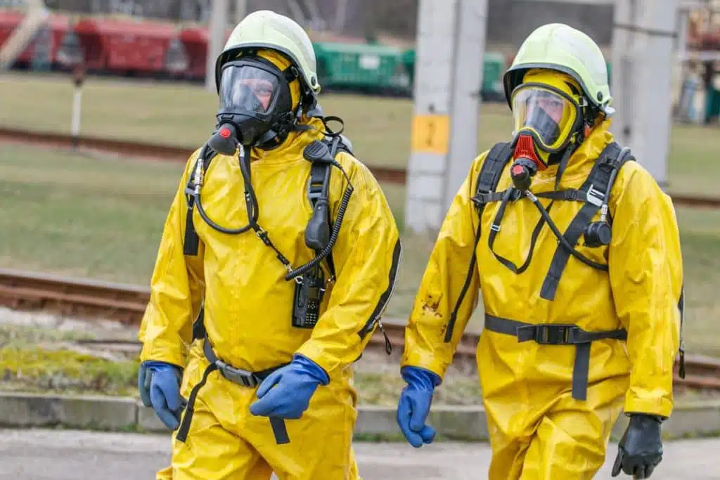 Rescuer with protective suit exploring danger area