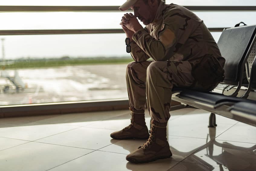 a soldier sitting and thinking