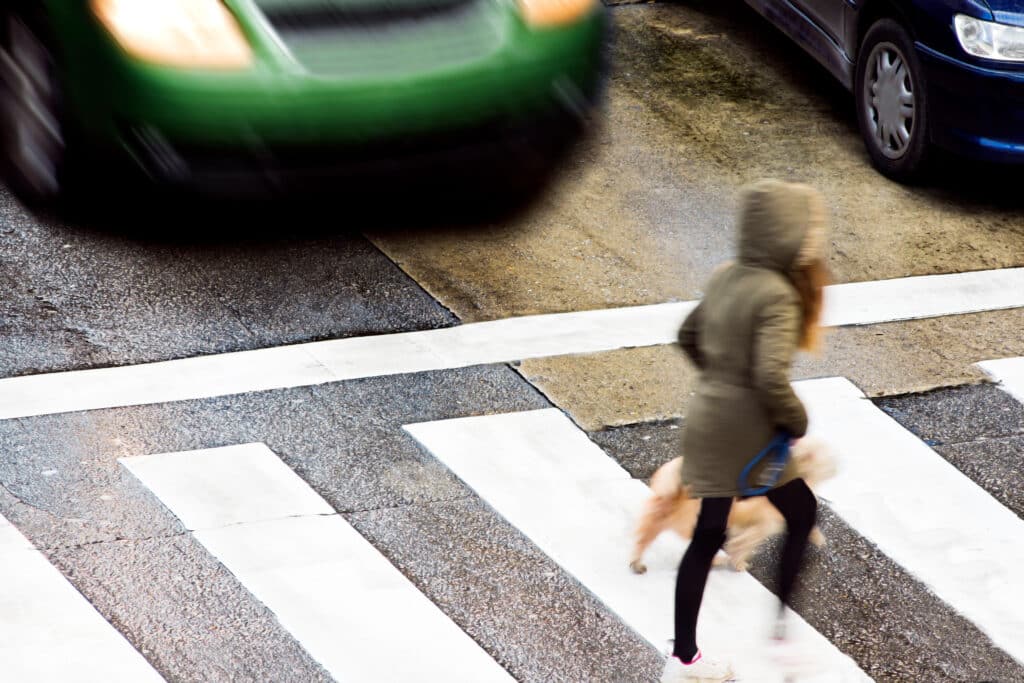 crosswalk of street city with woman in dangerous situation