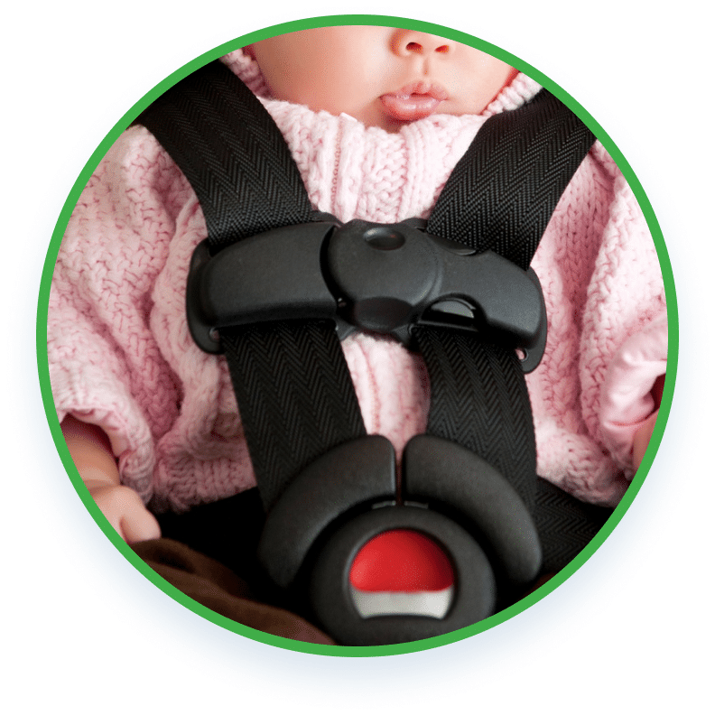 baby strapped on a child seat belt