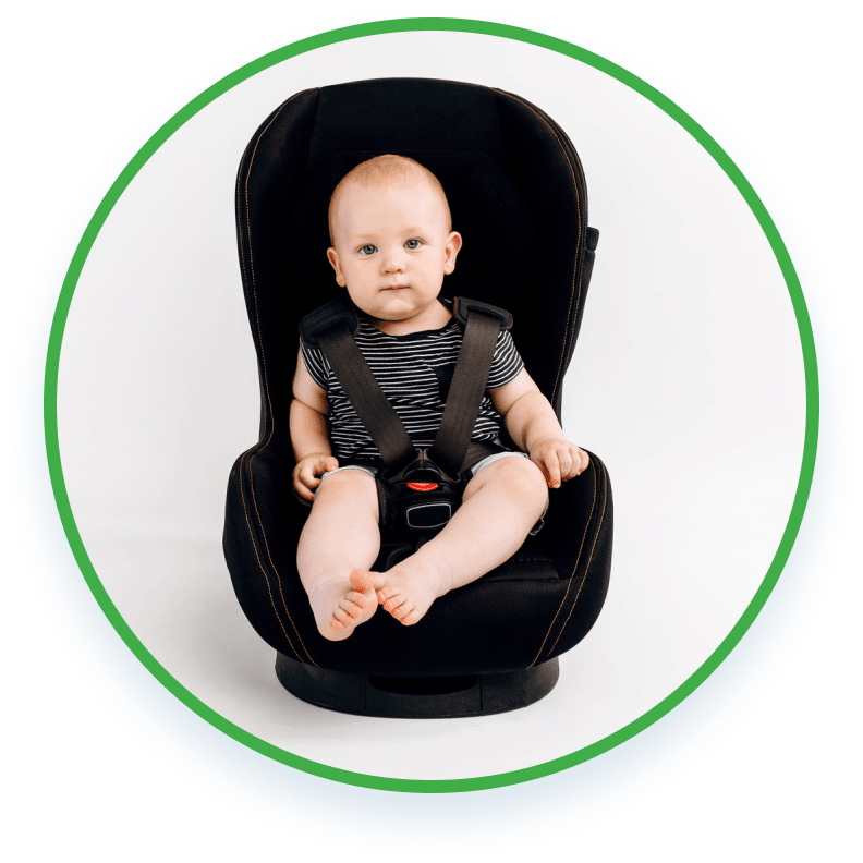 baby strapped on a child car seat belt