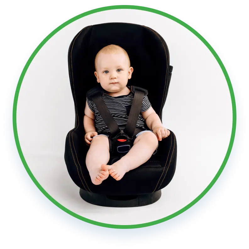 baby strapped on a child car seat belt