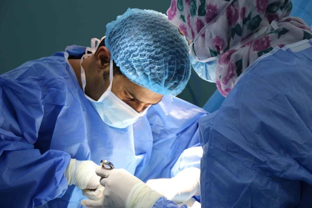 doctors carrying our a surgery