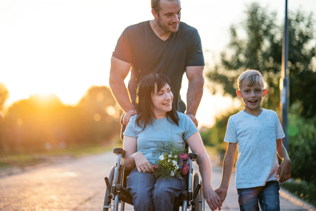 Family with disabled mother in wheelchair