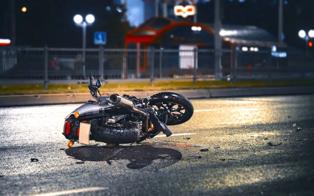 damaged motorcycle on asphalt after a motorcycle accident