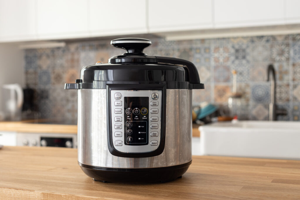 a modern pressure cooker on a countertop in a kitchen