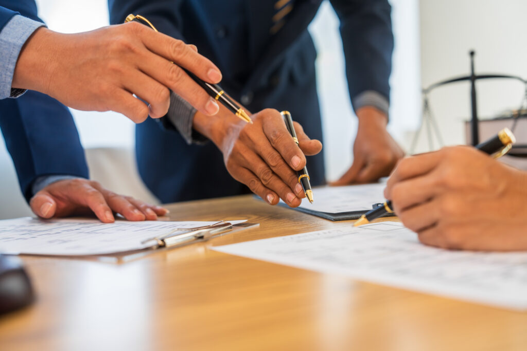 a lawyer and a client doing a deposition for a personal injury case