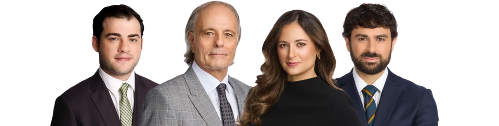 Four attorneys from Farah & Farah posing side by side, including Eddie Farah, Khalil Farah, Dalya Farah, and Ramzi Farah, against a black background.