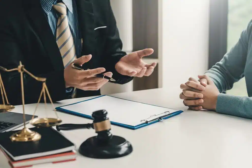 A lawyer speaking to a client