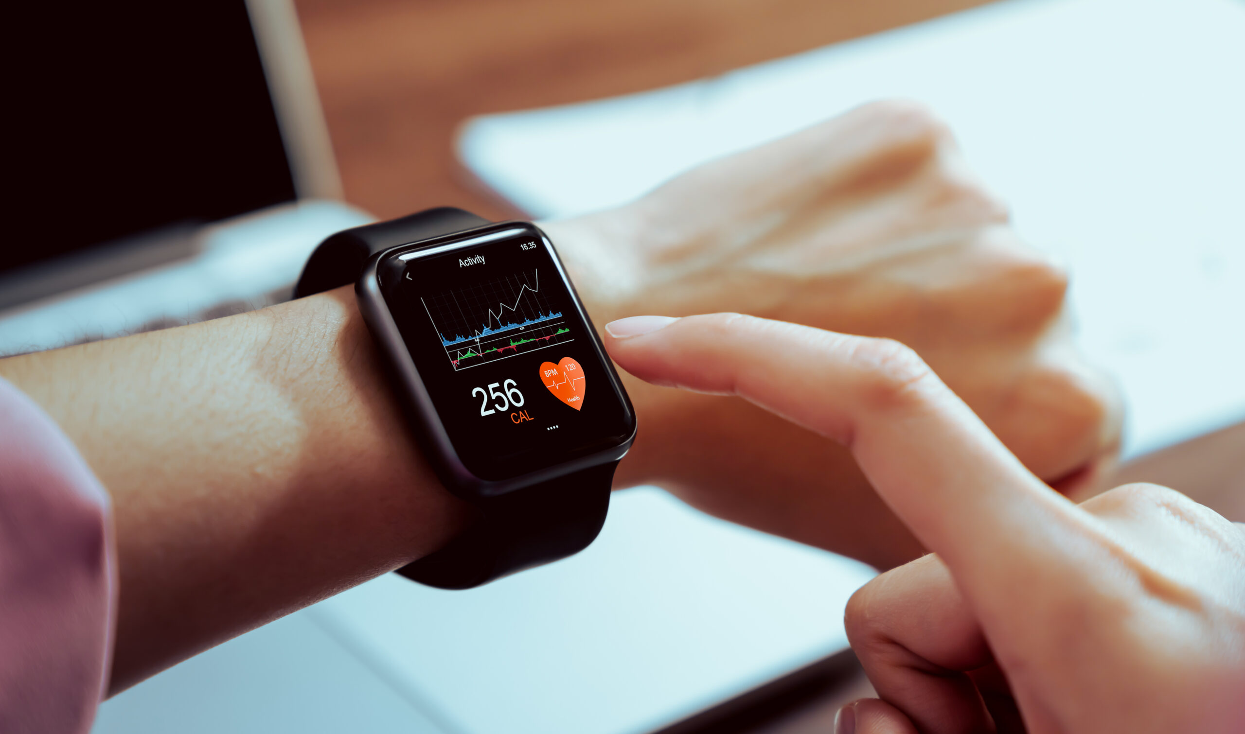 a smartwatch showing activity data