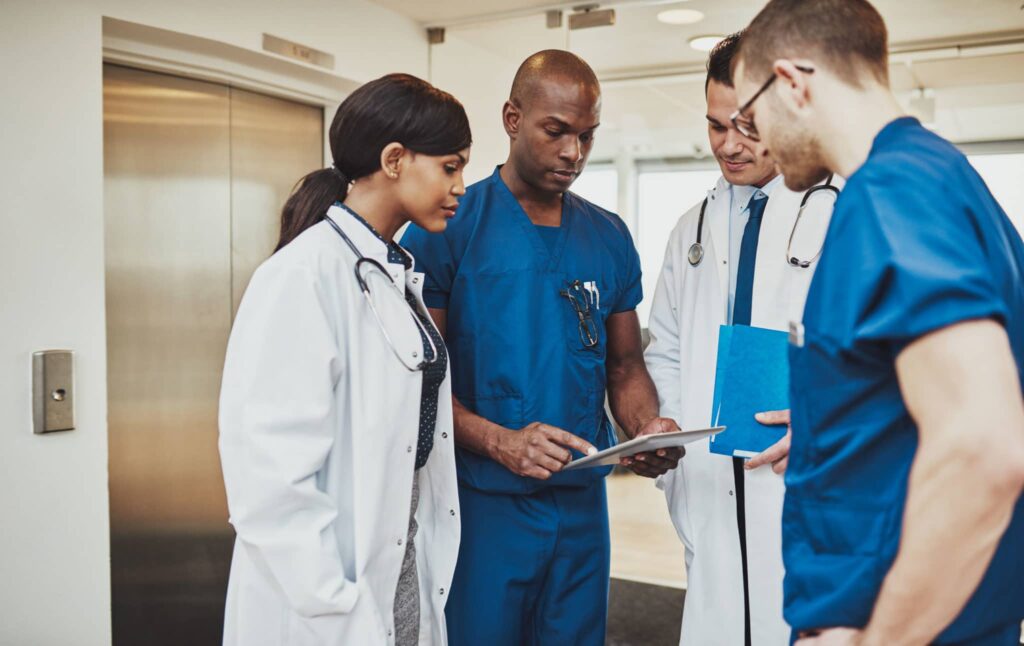 Doctors deliberating on patient test results