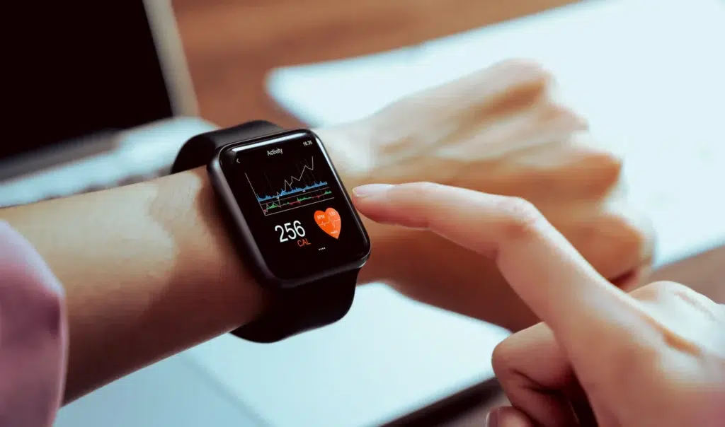 A person monitoring their heartbeat on their Apple Watch