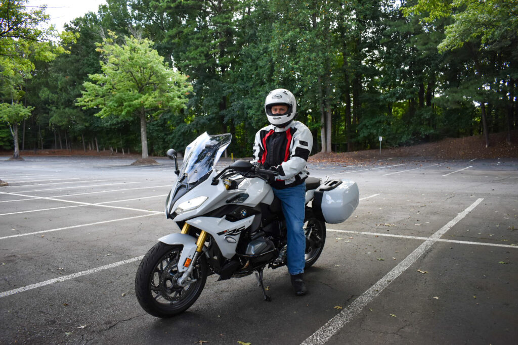 Farah & Farah motorcycle accident attorney Larry Silverman riding on motorcycle