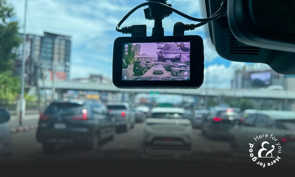 A dash cam on a car windshield