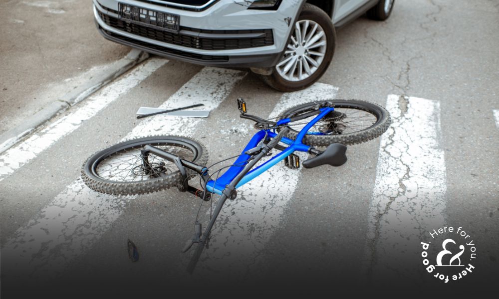 electric bike and a car collide on the street