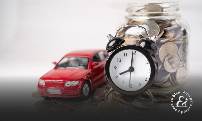 small red car pictured next to clock and jar of coin or compensation from car accident
